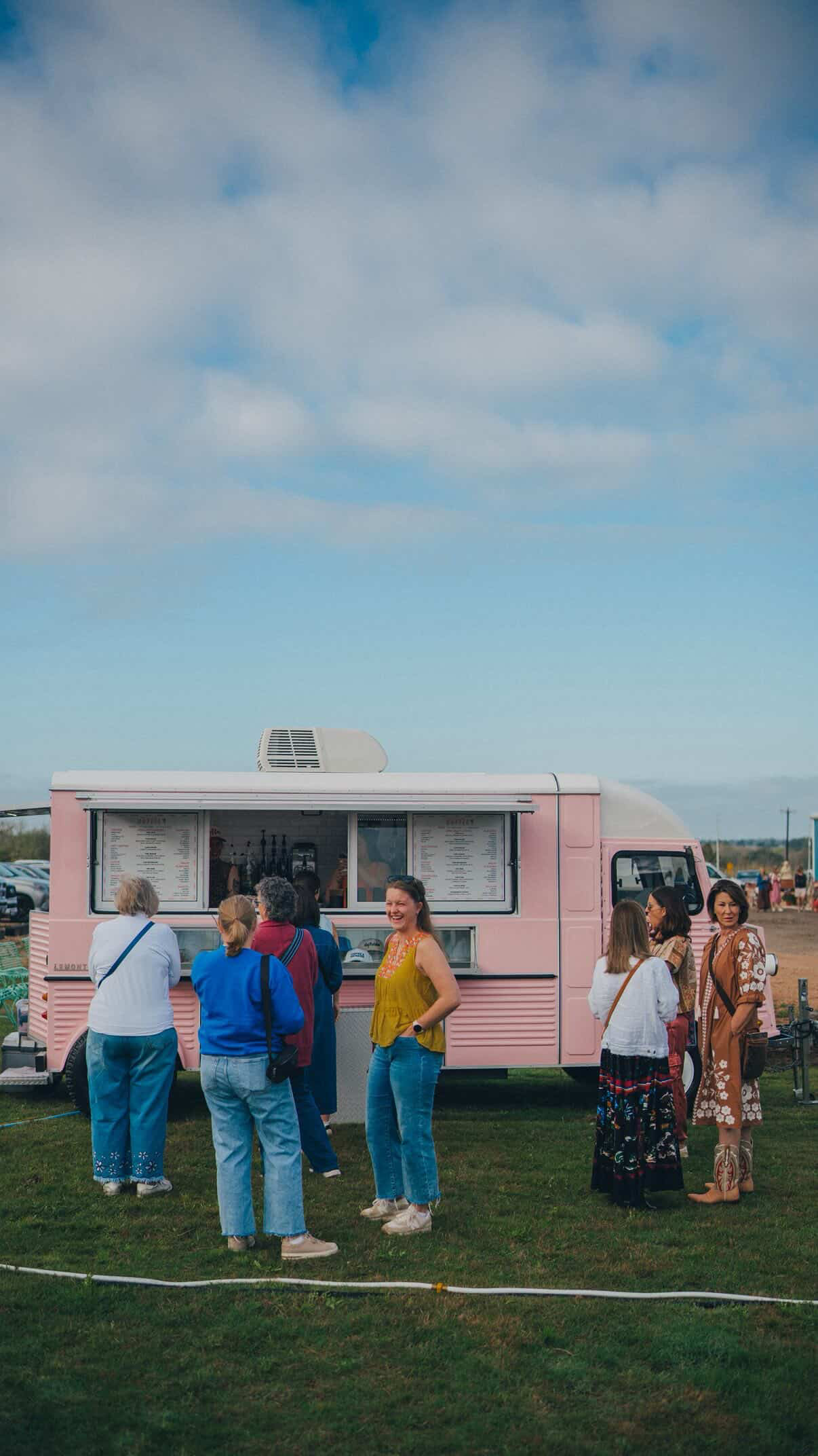 Guests gathering at the Pink Pony Club mobile café