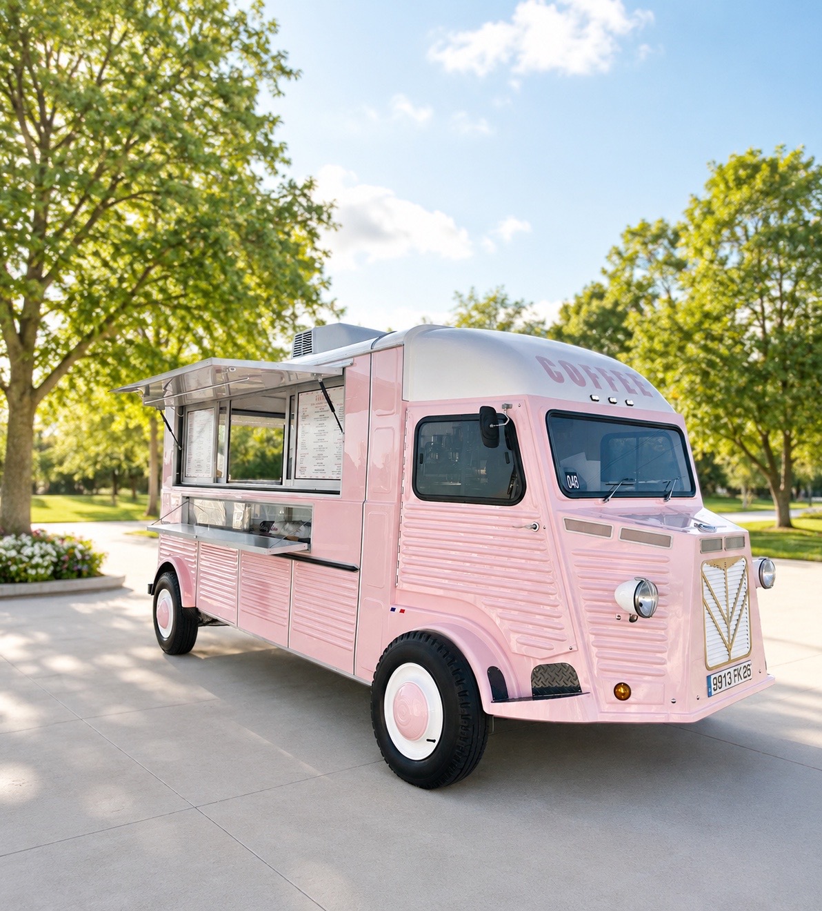 The Pink Pony Club mobile café in a sunny park setting
