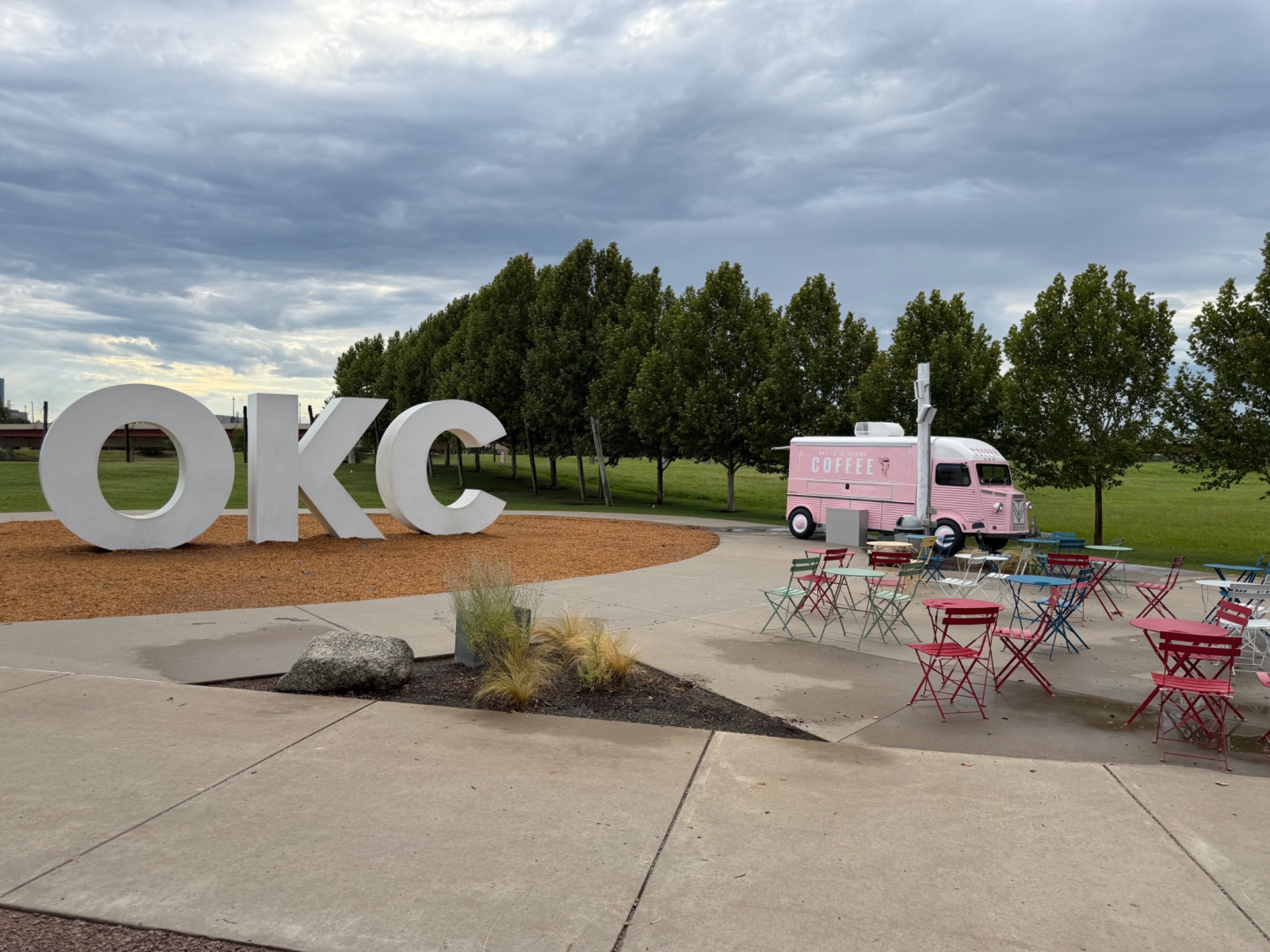 Pink Maple and Honey trailer at Scissortail Park near the OKC sign